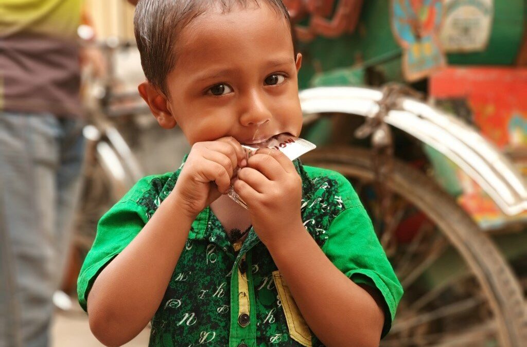 child eats snack